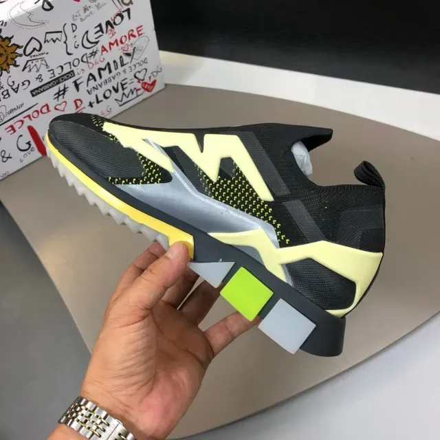 Dolce & Gabbana Chaussures lifestyle noires et jaunes avec tige tricot ajustable sock-fit et graphique foudre bold 6