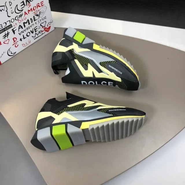 Dolce & Gabbana Chaussures lifestyle noires et jaunes avec tige tricot ajustable sock-fit et graphique foudre bold 8