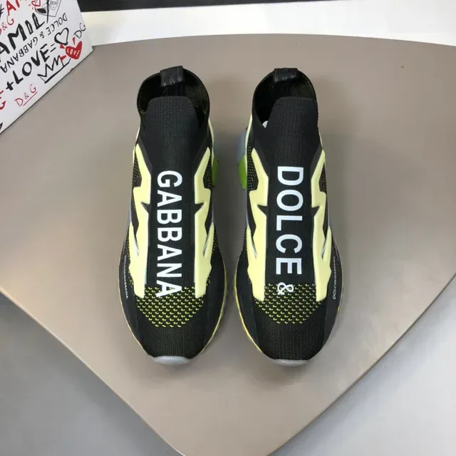 Dolce & Gabbana Chaussures lifestyle noires et jaunes avec tige tricot ajustable sock-fit et graphique foudre bold 9