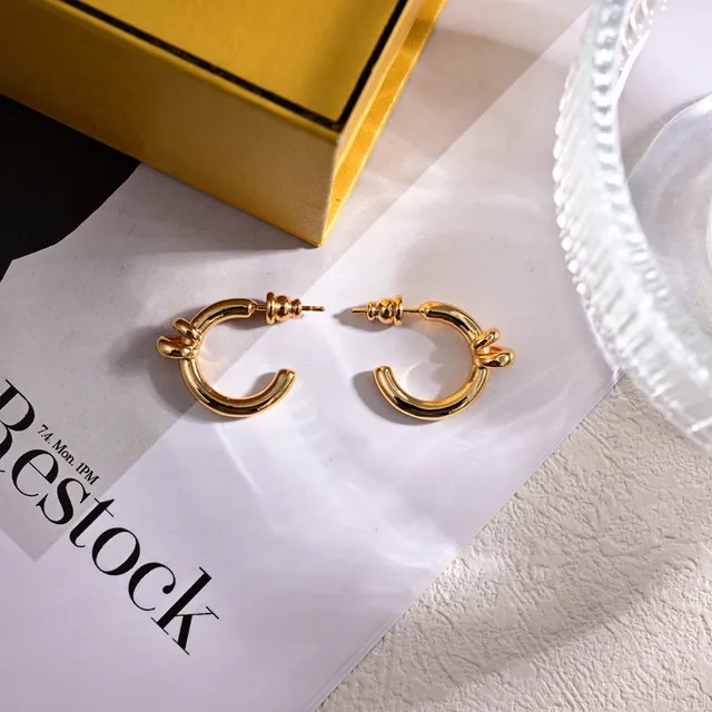 Brincos de aro Fendi nó dourado 5