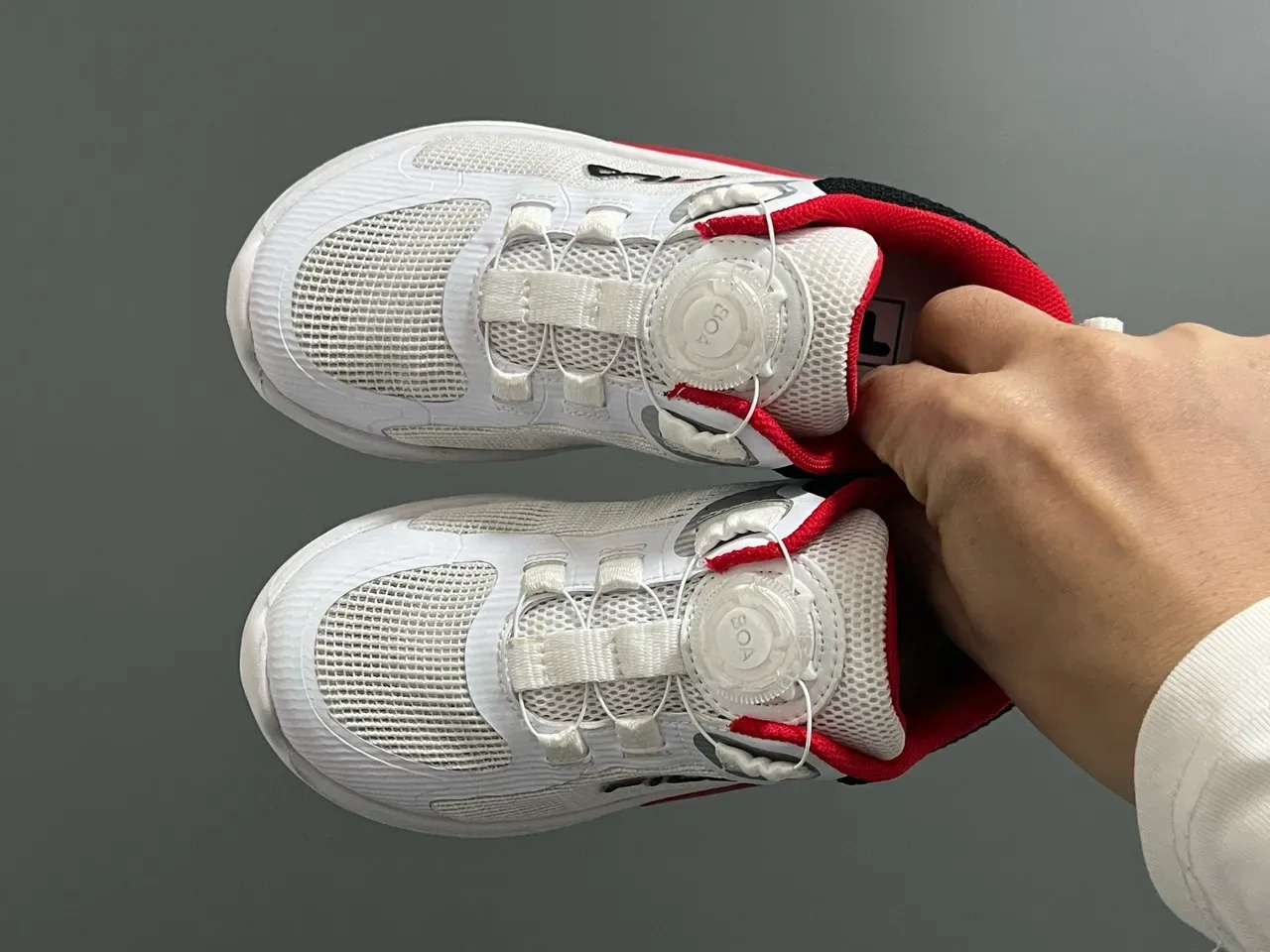 Fila Tênis Lifestyle branco e preto com upper de malha, fechamento com Dial-Lock 19
