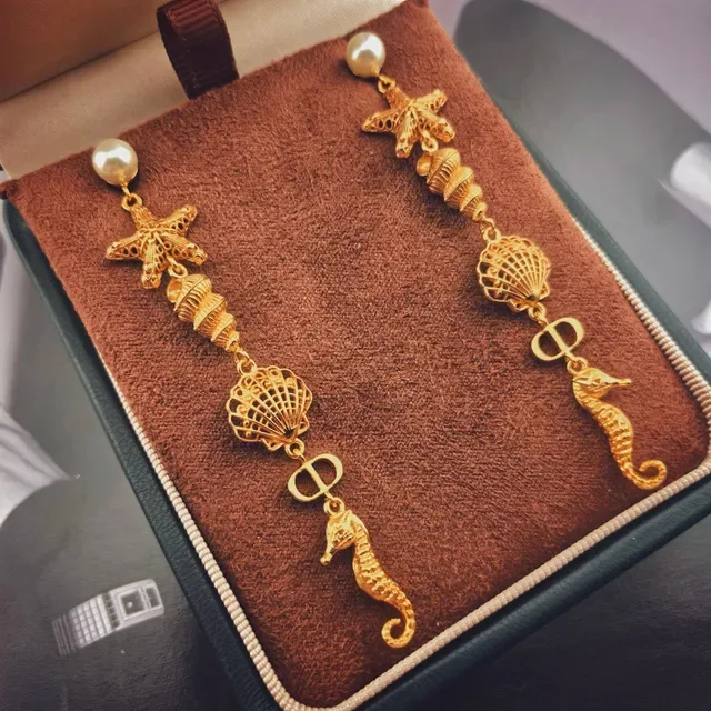 AnOrange Gold White Dangling Marine-Themed Earrings 2