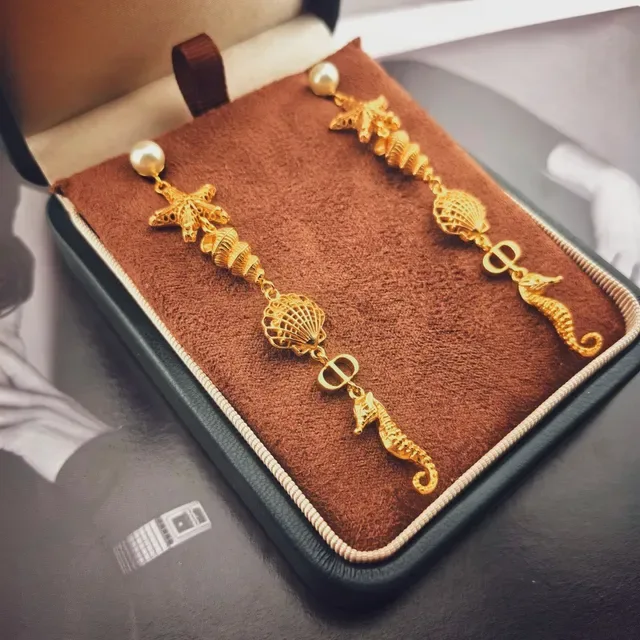 AnOrange Gold White Dangling Marine-Themed Earrings 3