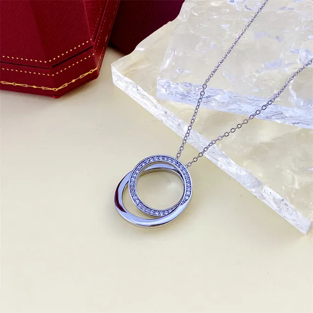 Gold and Silver Double Interlocking Ring Pavé Pendant Necklaces 4