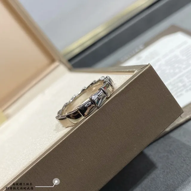 Gold and Silver Segmented Faceted Band Rings 6