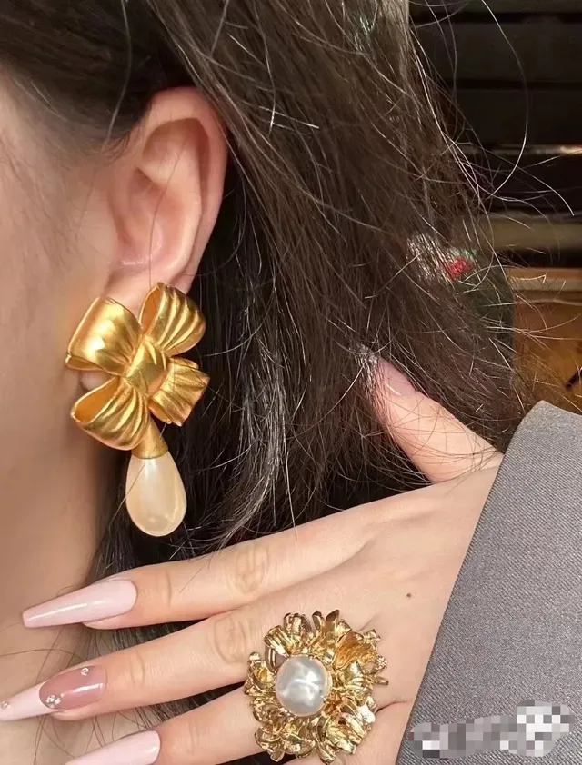 Gold Bow Motif Teardrop Dangle Earrings 2