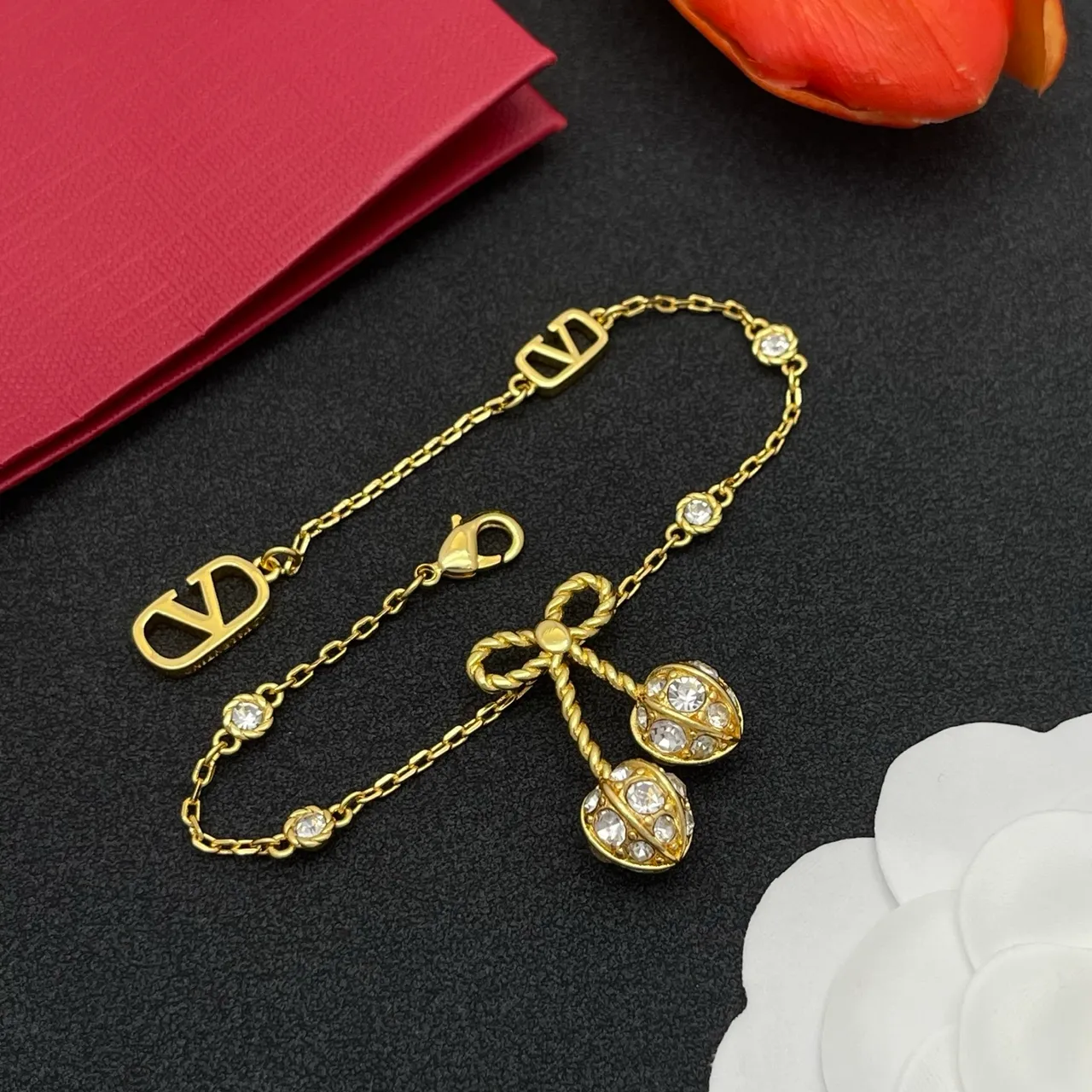 Gold-Tone Crystal Bow Charm V-Logo Chain Bracelet 3