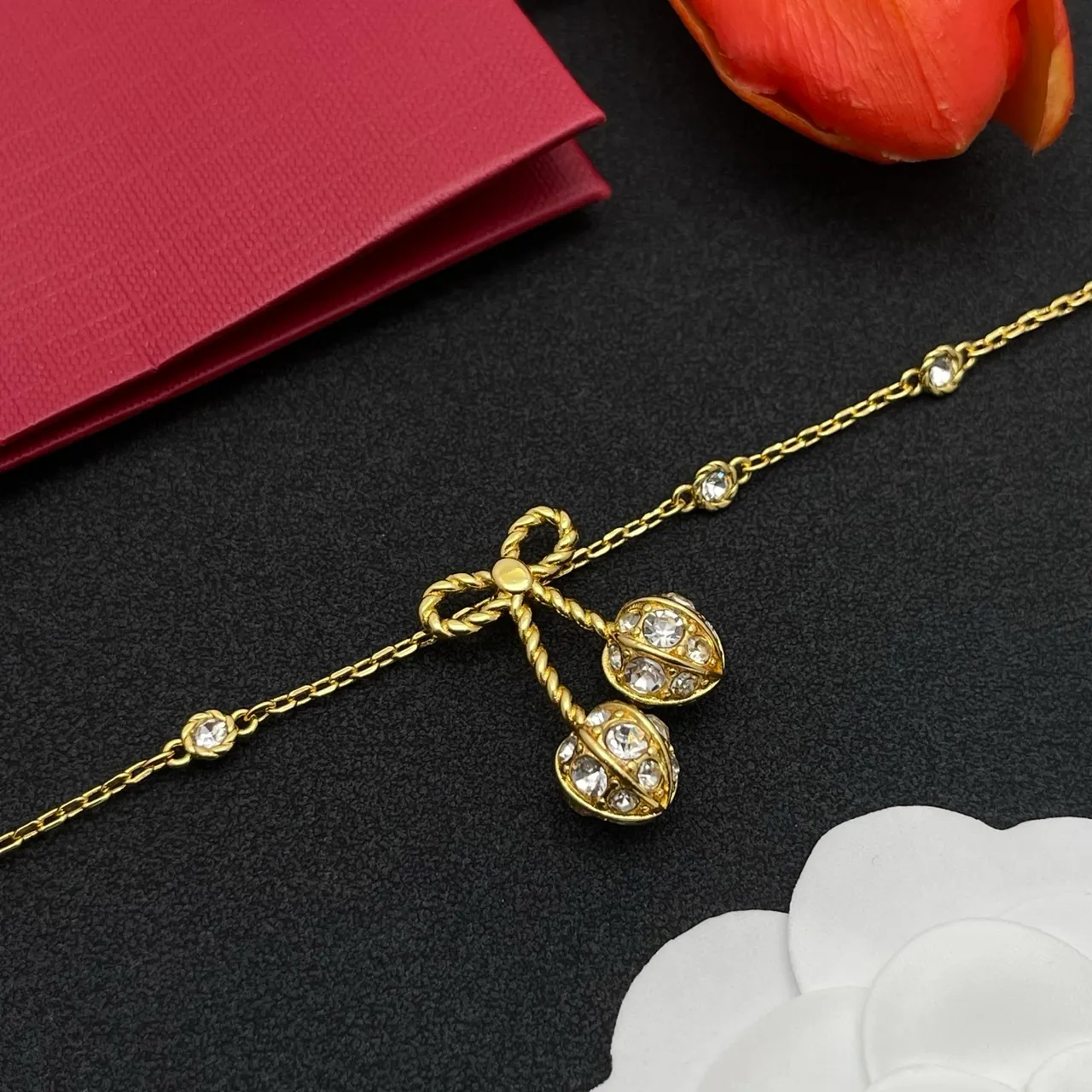 Gold-Tone Crystal Bow Charm V-Logo Chain Bracelet 4