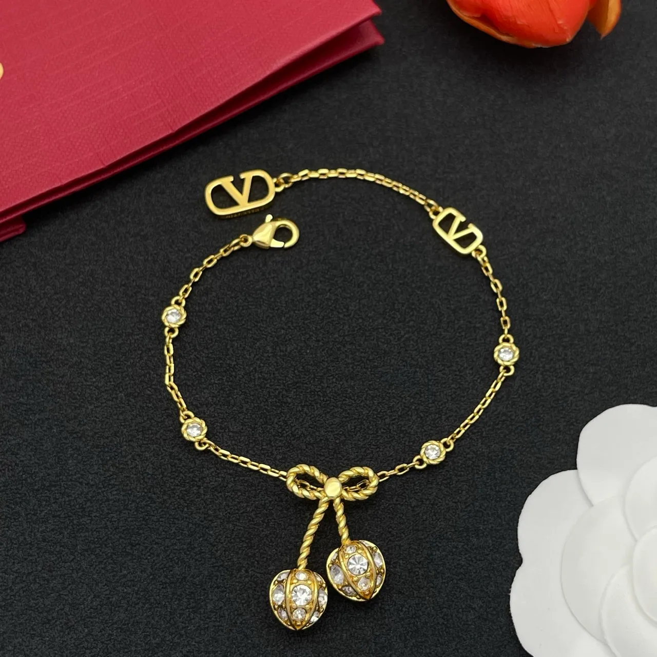 Gold-Tone Crystal Bow Charm V-Logo Chain Bracelet 6
