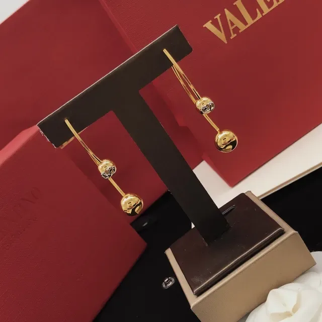 Gold-Tone Dangling Spherical Bead Earrings 2