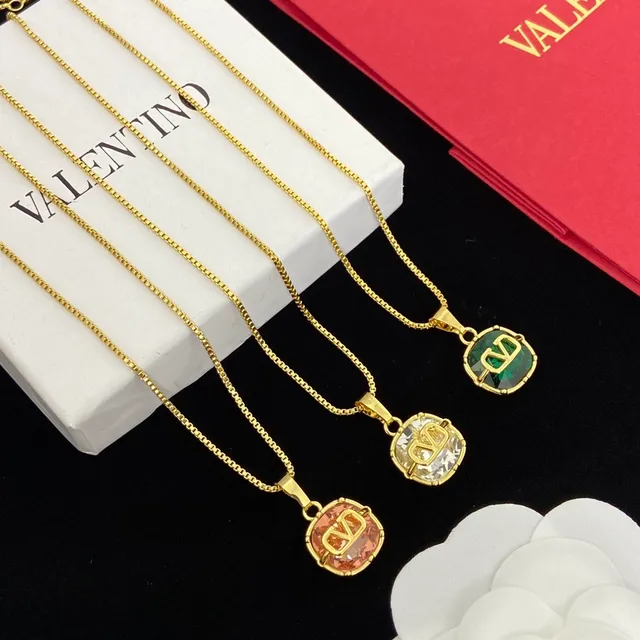 Gold-Tone Monogram Crystal Pendant Necklaces 2