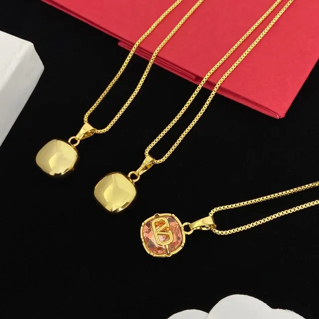 Gold-Tone Monogram Crystal Pendant Necklaces 6