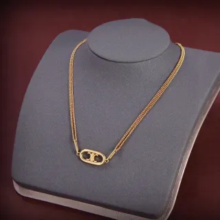 Gold-Tone Oval Interlocking Monogram Pendant Necklace