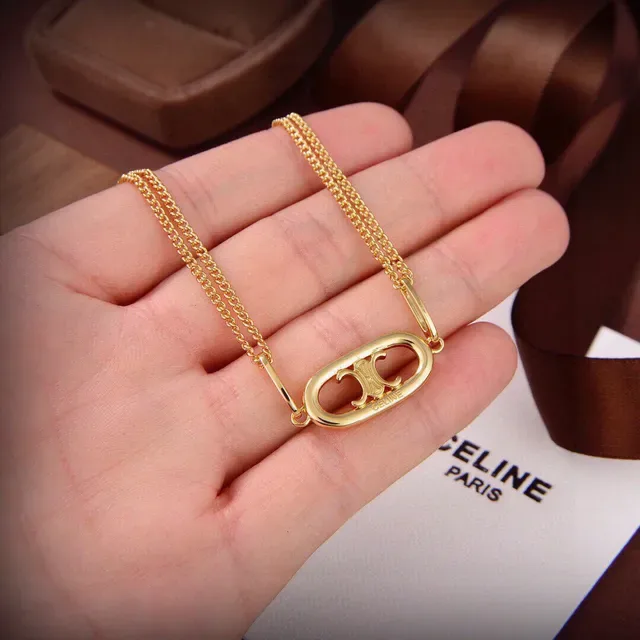 Gold-Tone Oval Interlocking Monogram Pendant Necklace 2