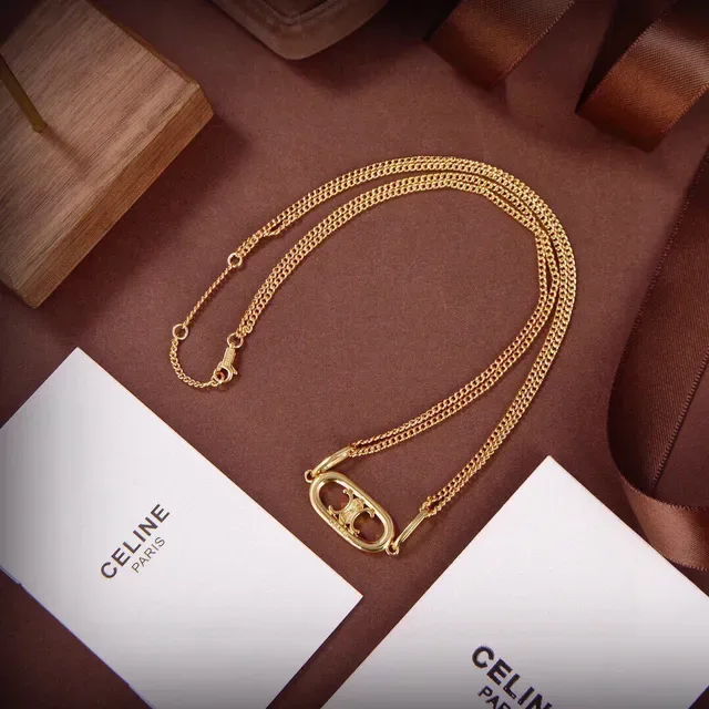 Gold-Tone Oval Interlocking Monogram Pendant Necklace 7