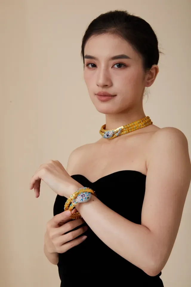 Gold-Tone Serpent Coil Gem-Encrusted Bracelet 9