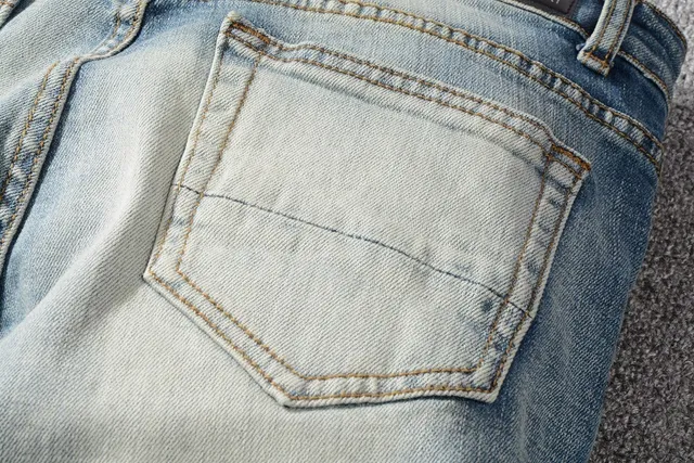Light-Wash Distressed Snake Embroidery Slim-Fit Jeans 10