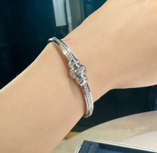 Piaget Gold and White Gold Pavé-Set Bangle Bracelets 9