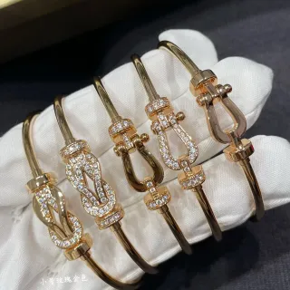 Pulseras con broche de nudo de cristal Pavé en tono dorado rosa