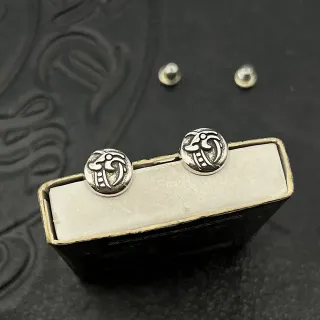 Silver-Toned Engraved Symbolic Motif Stud Earrings