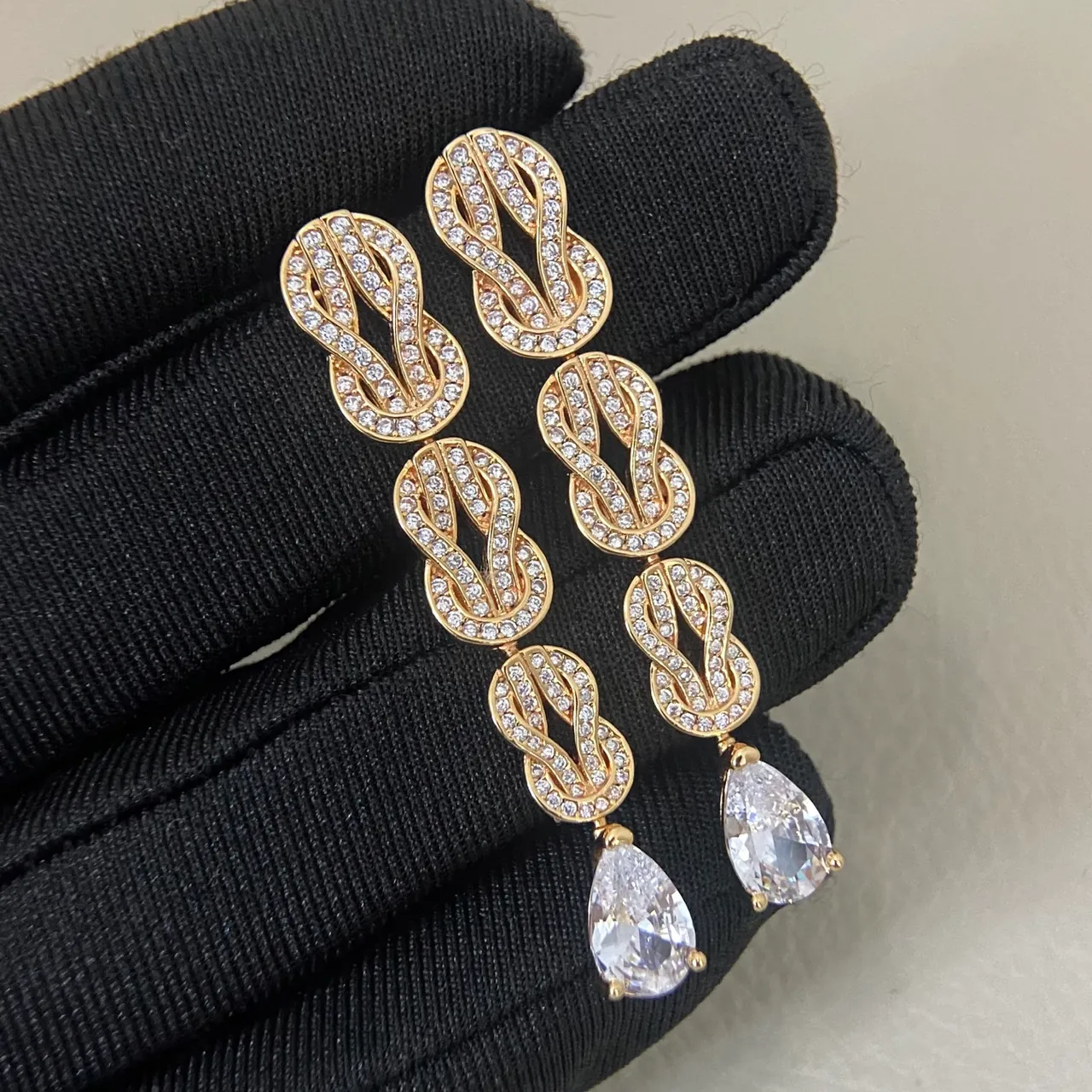 Triple Knot Pavé and Pear Drop Dangling Earrings 4