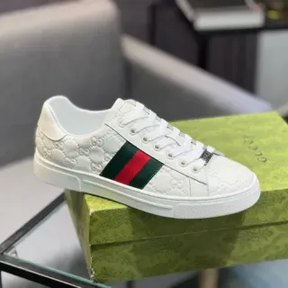 Gucci Ace White Embossed GG Monogram Web Stripe Lifestyle Sneakers
