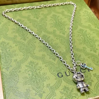 Gucci astronaute et GG Charme de Clé Collier