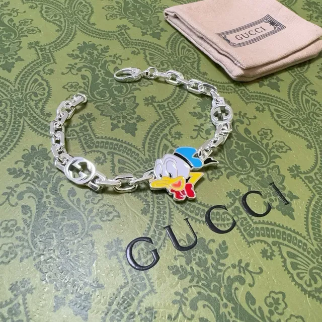 Gucci Disney x Silver Multicolor Chain-Link Enamel Charm Bracelet 9