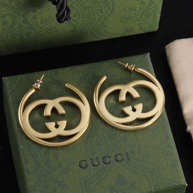 Boucles d'oreilles Gucci Double G en métal doré avec logo interlocking 5