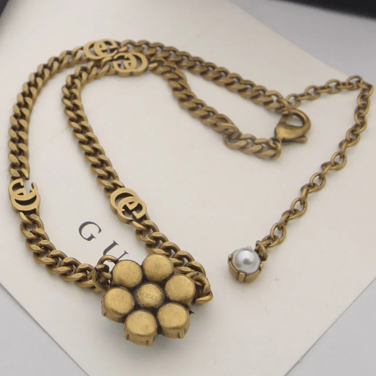 Gucci GG Marmont سلسلة لؤلؤي كلستر ذهبية 3