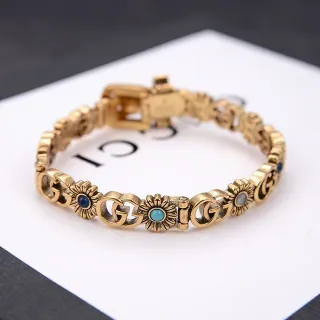 Gucci Pulseira de Metal Dourado Azul Interlocking GG Links