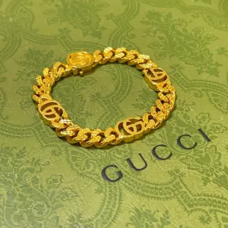 Gucci Pulseira dourada chunky com eslabões curb link entrelazados com logos G