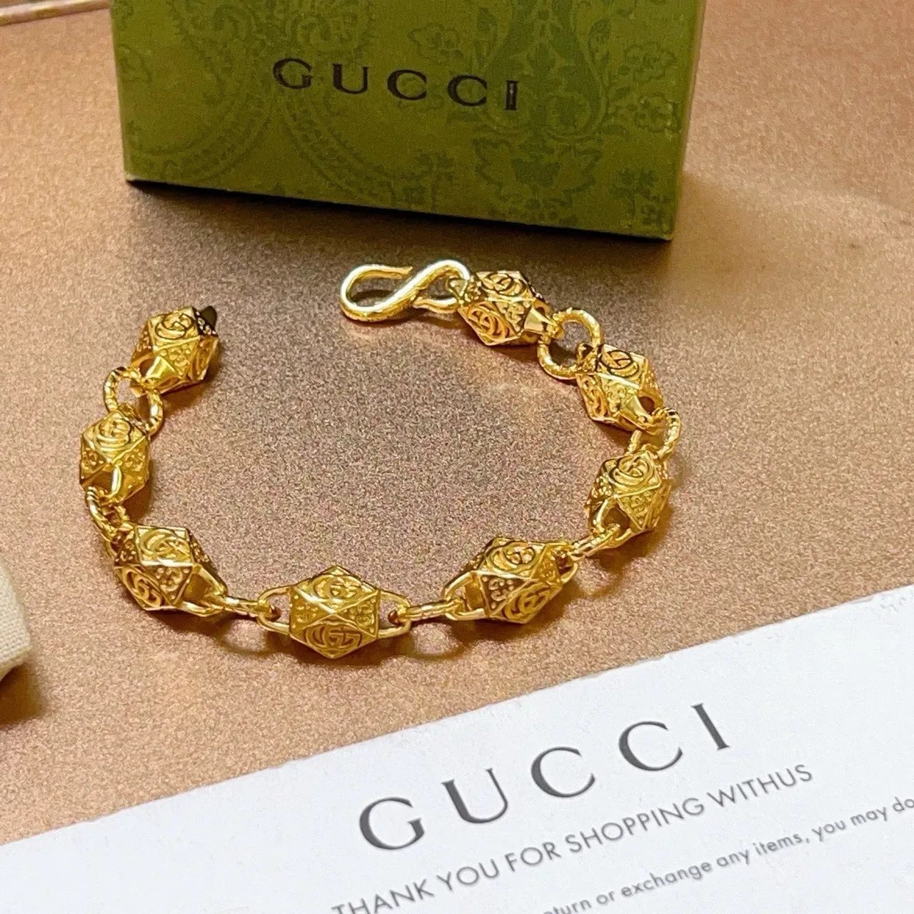 Gucci Gold-Toned Geometric GG Motif Bracelet 2