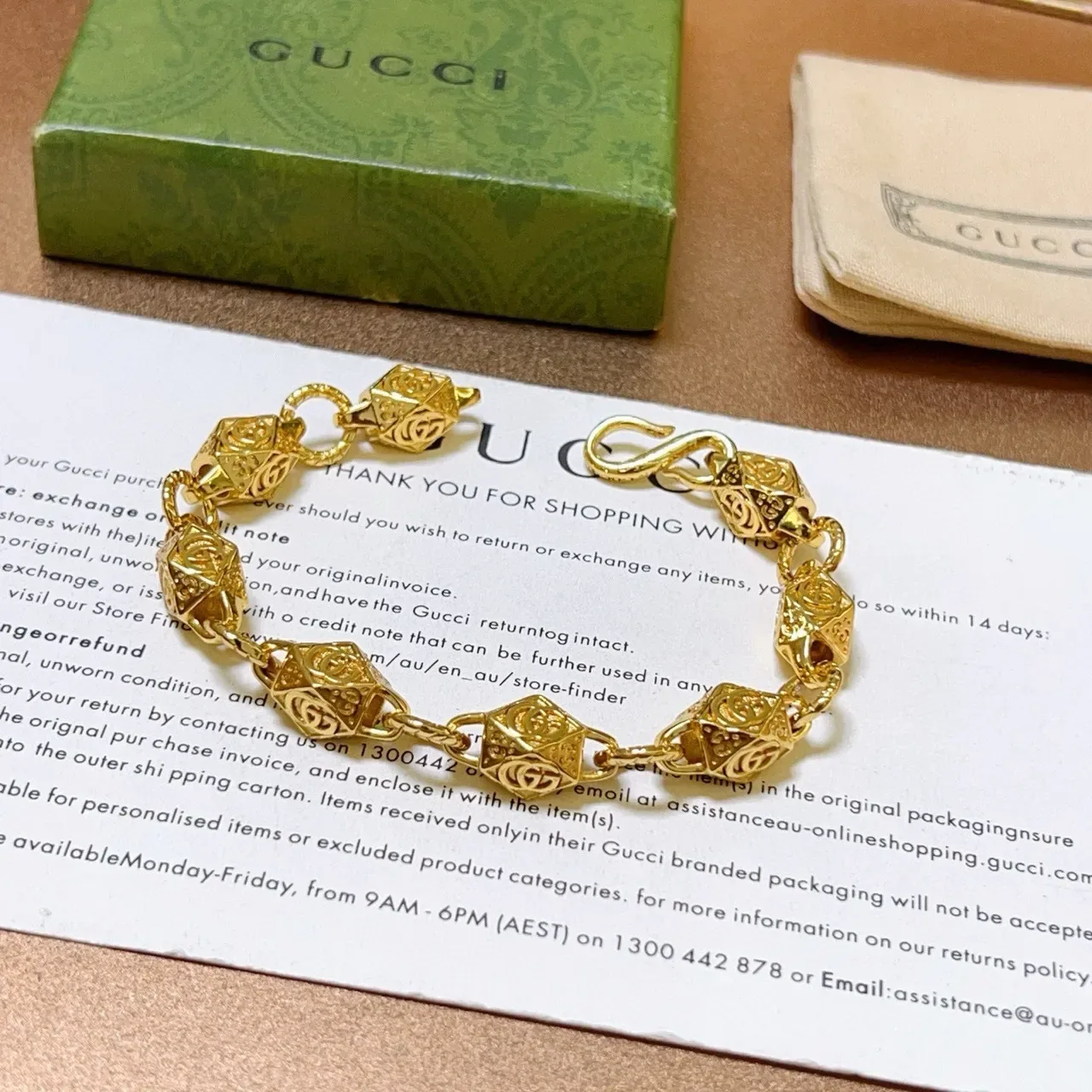 Gucci Gold-Toned Geometric GG Motif Bracelet 3