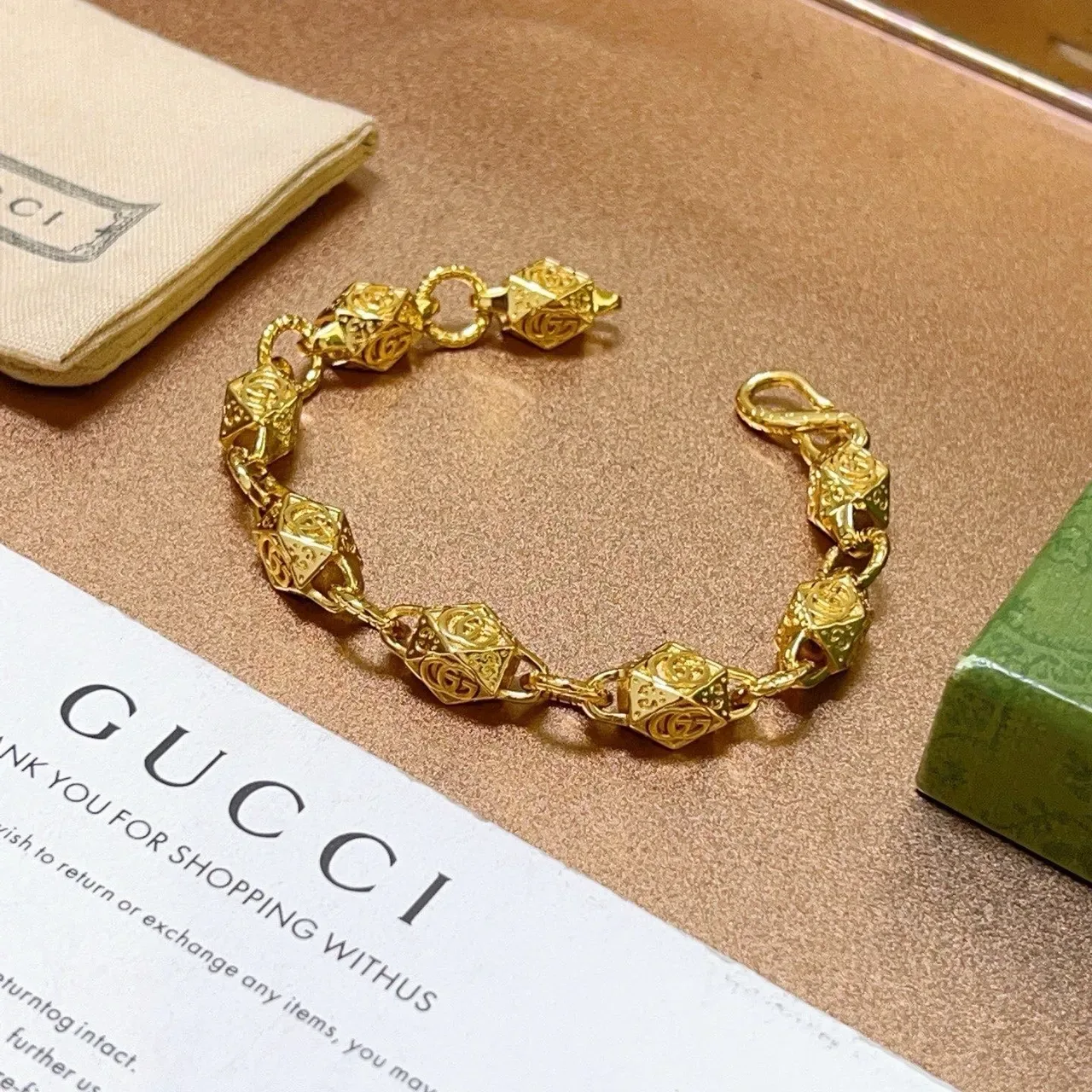 Gucci Gold-Toned Geometric GG Motif Bracelet 5