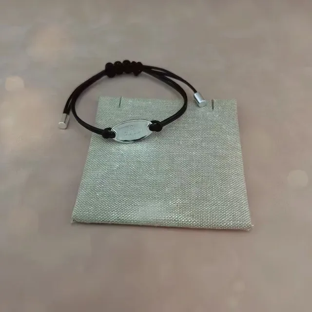 Gucci Knotted Black Cord and Silver-Tone Plaque Bracelet 5