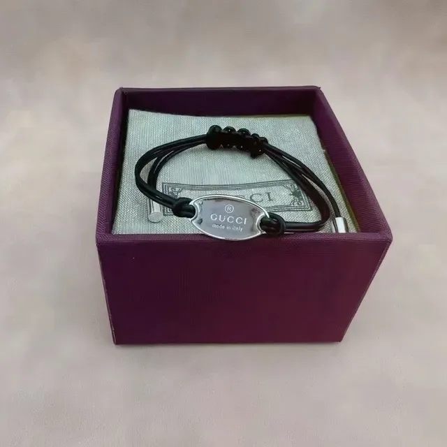 Gucci Knotted Black Cord and Silver-Tone Plaque Bracelet 7