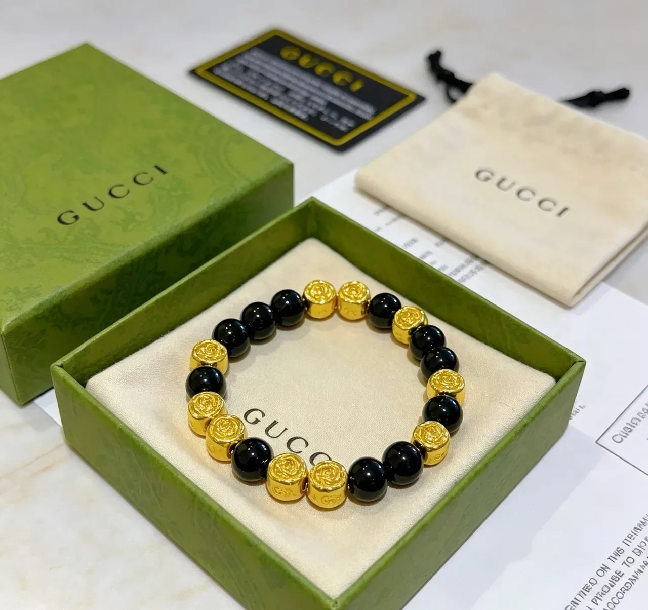 Gucci Rose Motif Black Gold Beads Polished Bracelet 9