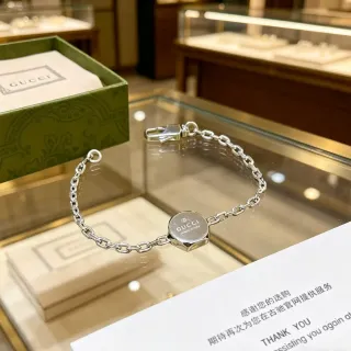 Gucci Silver Chain-Link Circular Engraved Medallion Bracelet