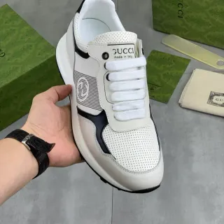 Gucci أبيض أسود مثقوبة أصابع لوح جانبي مخطط حذاء أسلوب الحياة