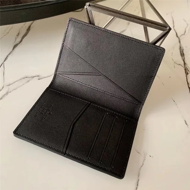 Louis Vuitton Black Pebbled Leather Embossed Monogram Card Holder 3