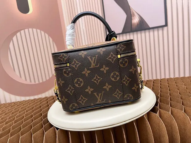 Louis Vuitton Boîte Chapeau Bolso Tote Marrón Monograma Lona 5