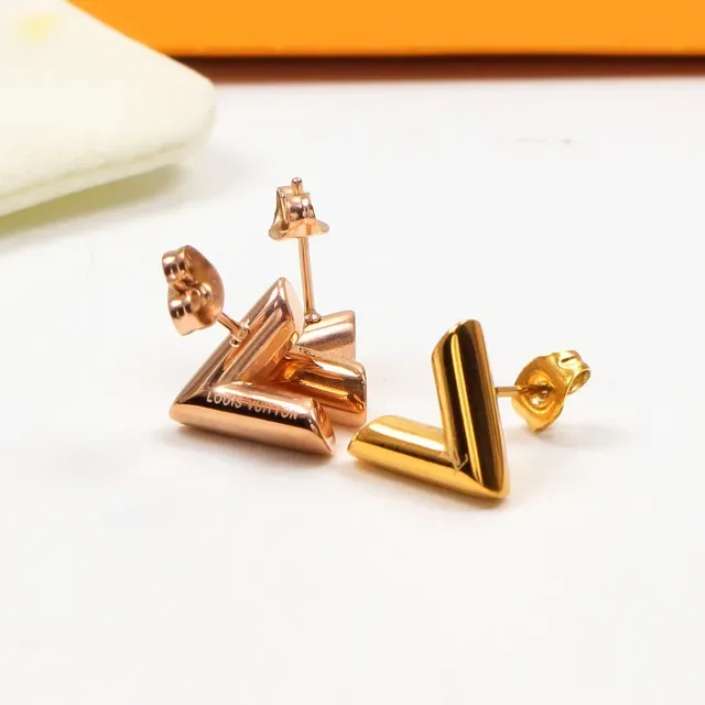 Louis Vuitton Gold Silver Geometric V-Shaped Earrings 4