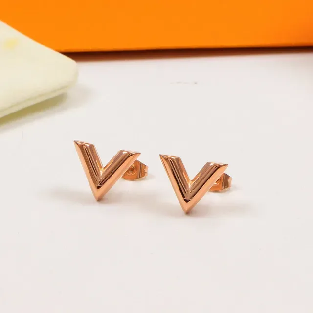 Louis Vuitton Gold Silver Geometric V-Shaped Earrings 6