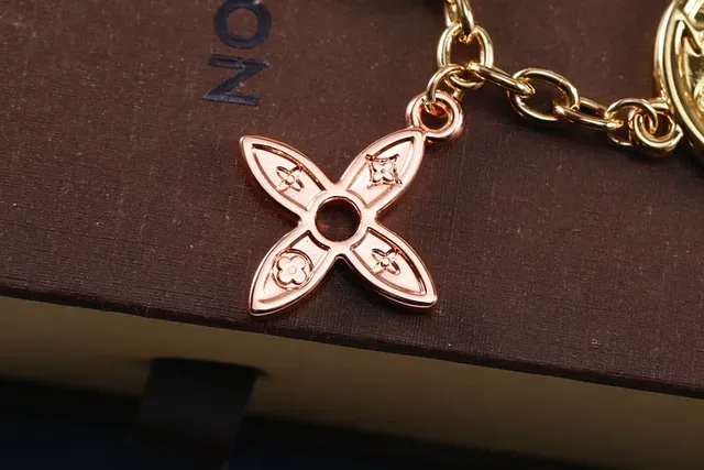 Louis Vuitton Gold Silver Multi-Charm Metallic Bracelet 2