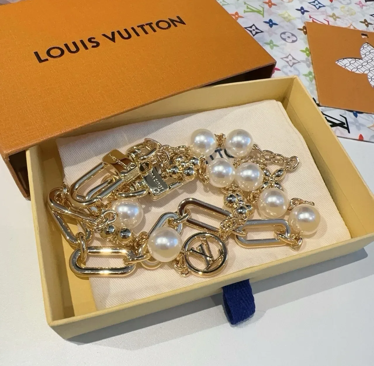 Louis Vuitton Gold-Tone Oval Link Pearl and LV Medallion Bracelet 3
