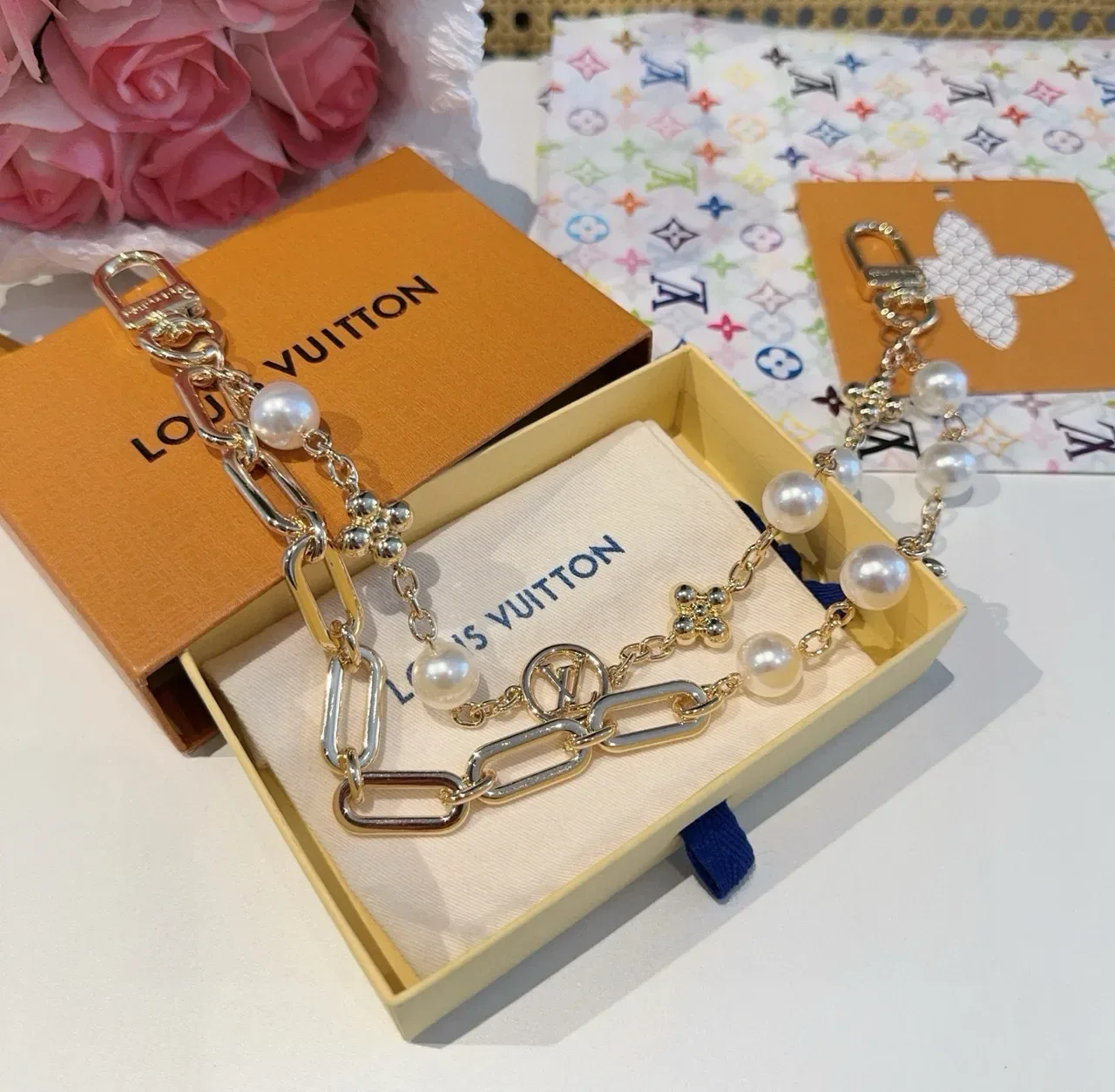Louis Vuitton Gold-Tone Oval Link Pearl and LV Medallion Bracelet 5