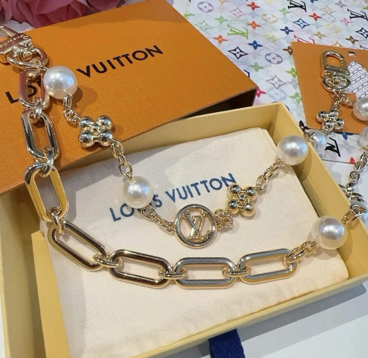 Louis Vuitton Gold-Tone Oval Link Pearl and LV Medallion Bracelet 6