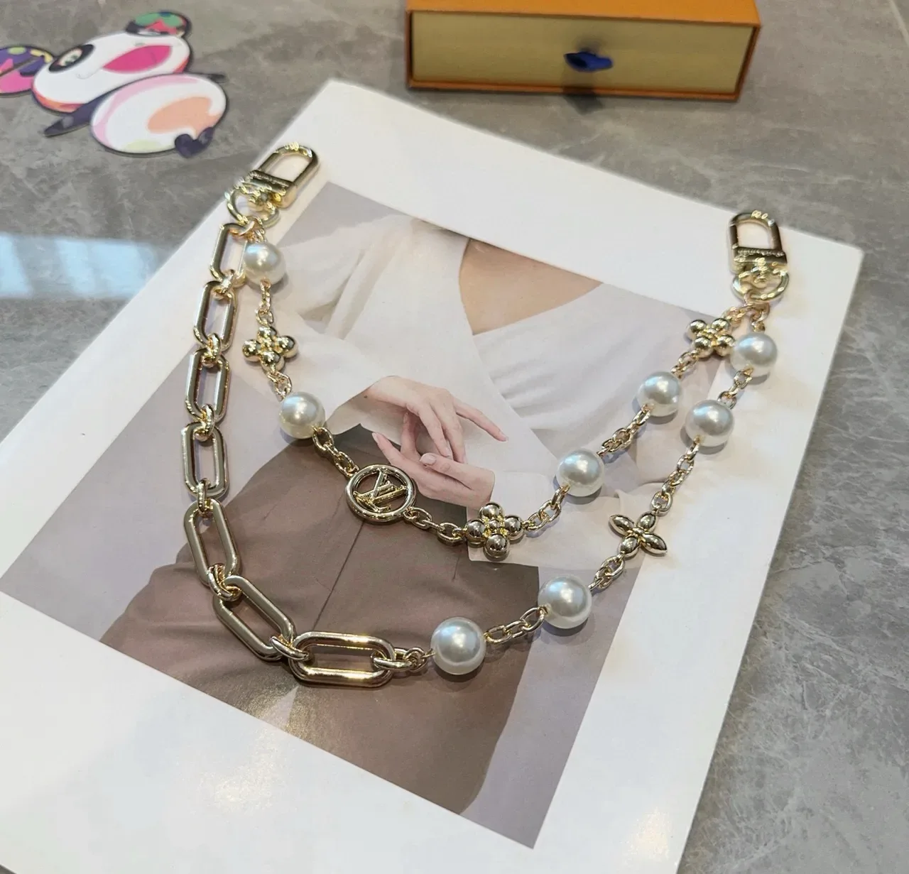 Louis Vuitton Gold-Tone Oval Link Pearl and LV Medallion Bracelet 7
