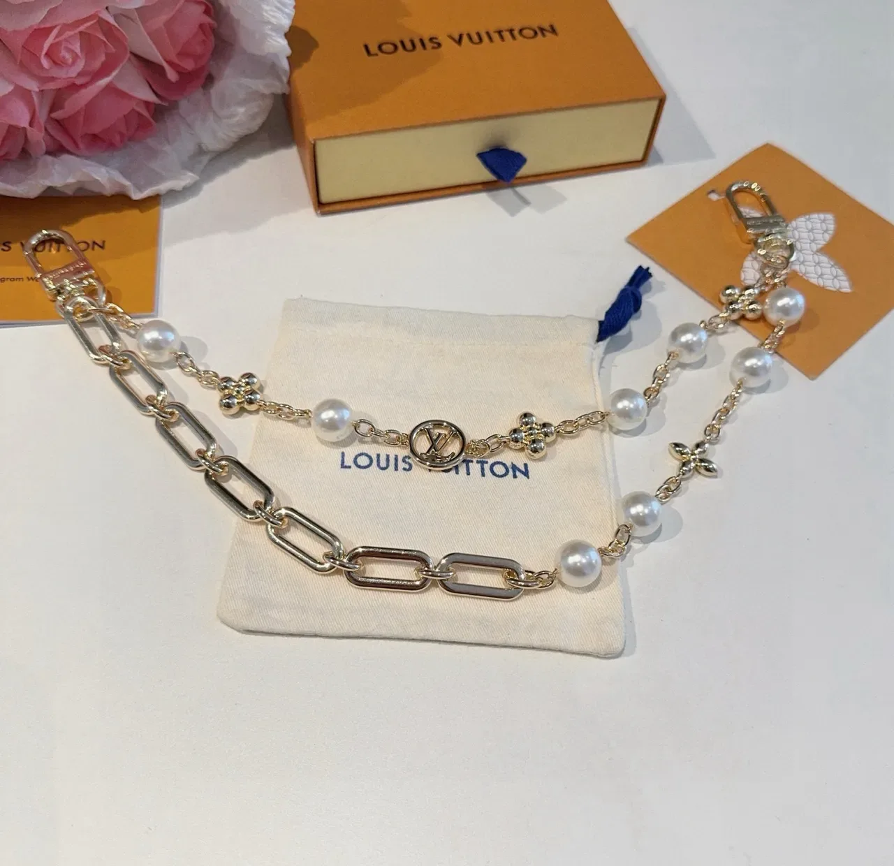 Louis Vuitton Gold-Tone Oval Link Pearl and LV Medallion Bracelet 8